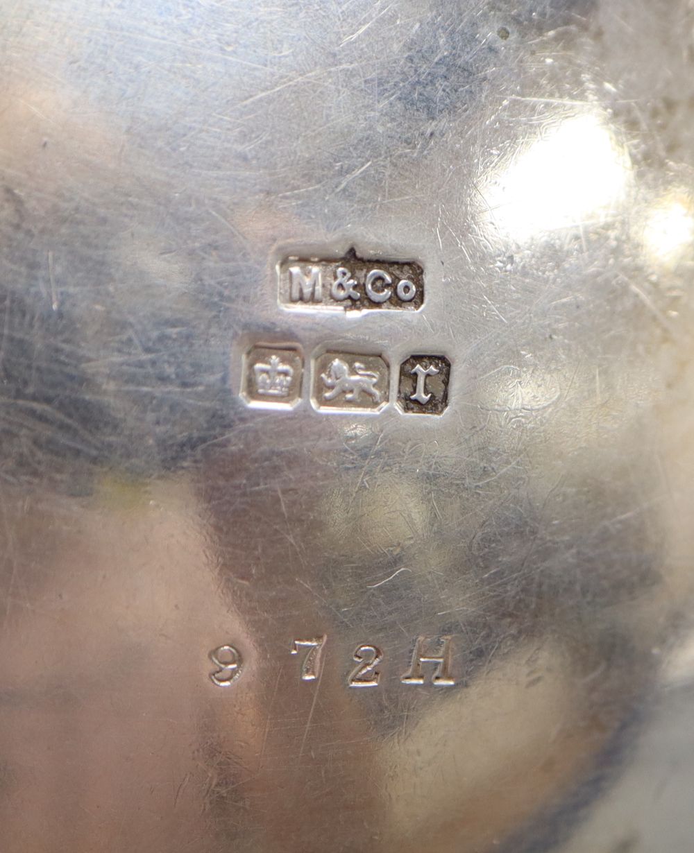 A Victorian silver cream jug, London, 1860, a later silver mustard, sauceboat and pair of pepperettes,